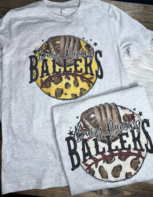 Busy Raising Ballers - Softball Graphic Tee